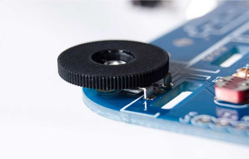 insert the first wheel into the PCB as shown